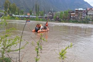 After heavy rain, water level in rivers & streams rises in Kashmir