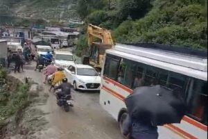 Uttarakhand Police clear debris near Gulabkoti, Pagalnala in Joshimath on Badrinath National Highway