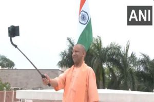 UP CM Yogi Adityanath hoists Tiranga at his Lucknow residence